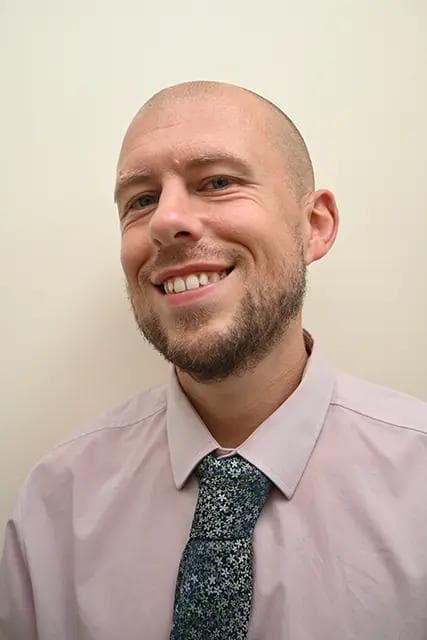 Staff Member